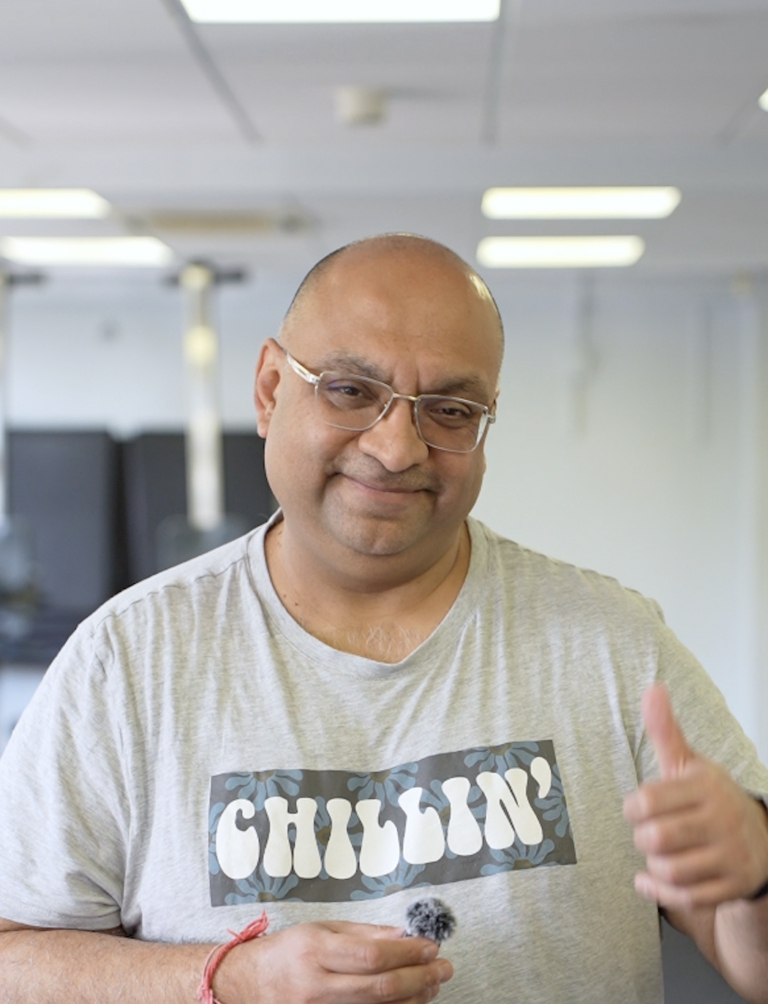 Personal training in St Albans – client being coached through strength training in a friendly, supportive space.