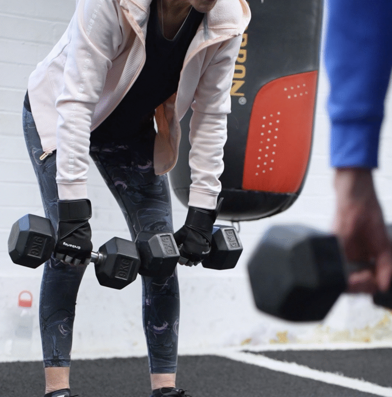 Personal training in Bedford – Anne enjoying a small group session at The Training Gyms.